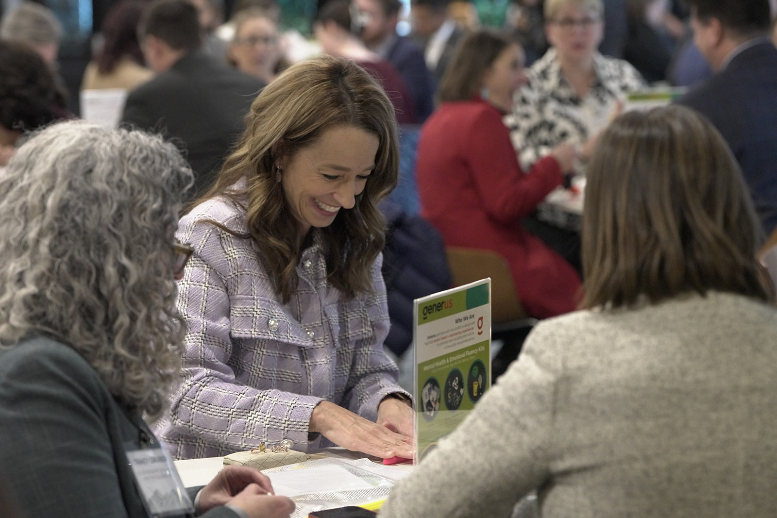 First Lady Abby Cox helping create mental health kits for high school students at January 8 Service Summit.